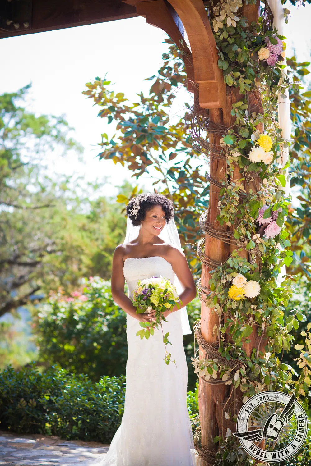 Bride in a white wedding dress posed for a bridal portrait in Austin, TX.