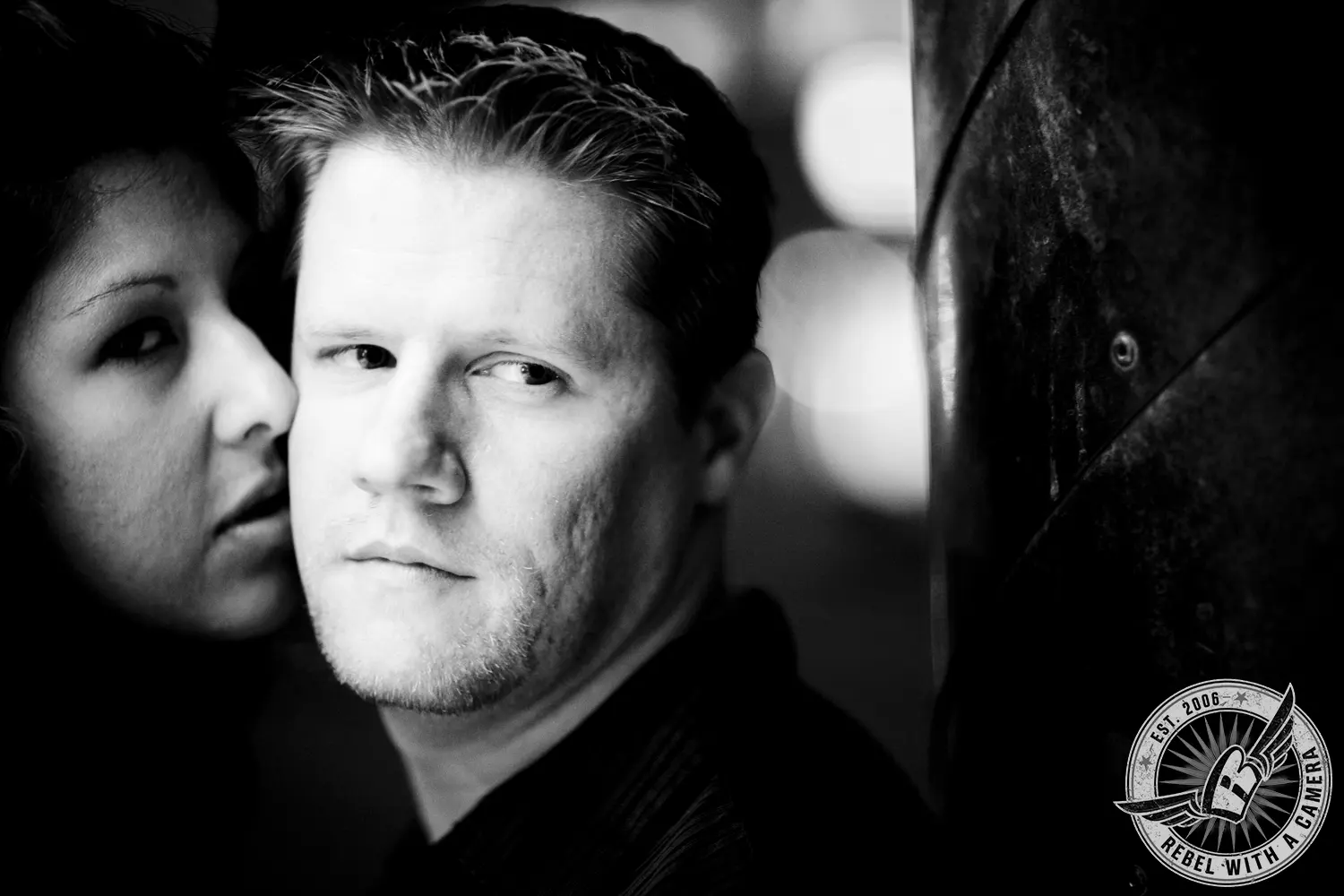 Black and white close-up of a couple together in Austin, TX.