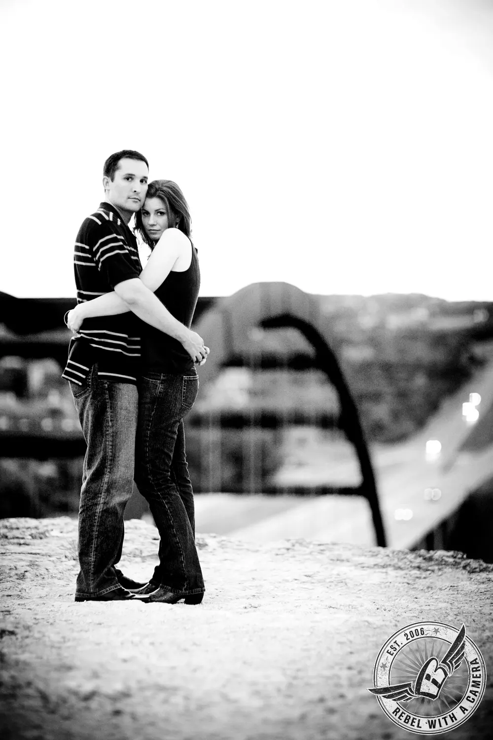 Black and white couple standing together above a city street in Austin, TX.