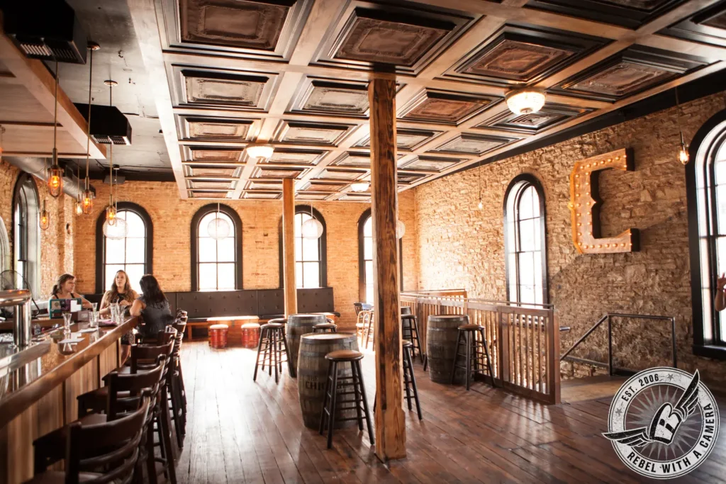 Restaurant and bar interior with guests at a corporate event