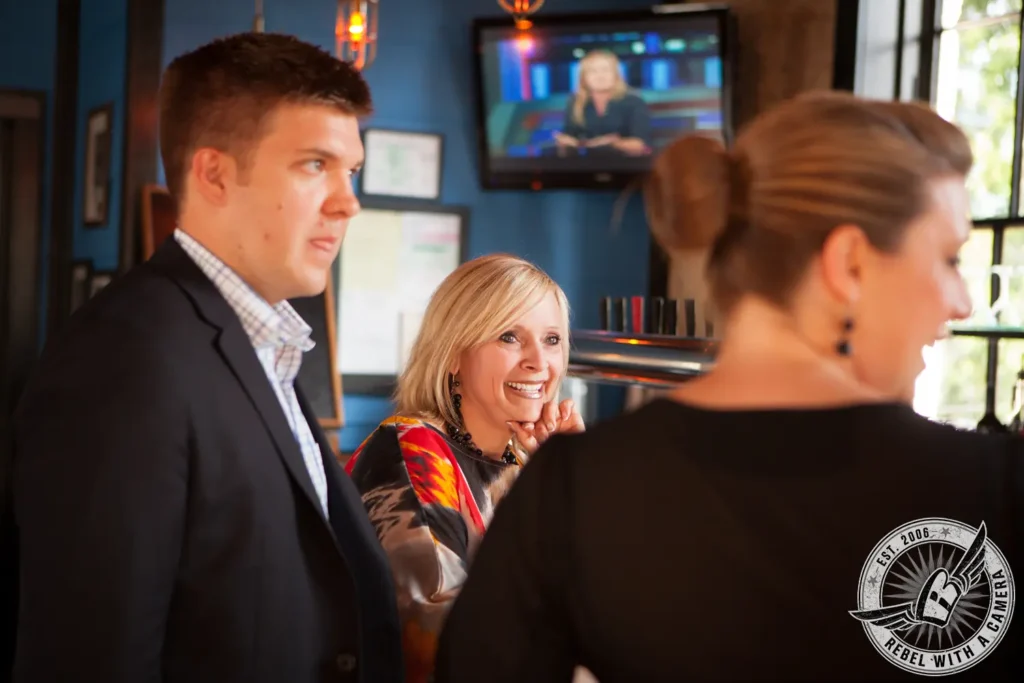Guests talking and smiling at a corporate event in Austin, TX.