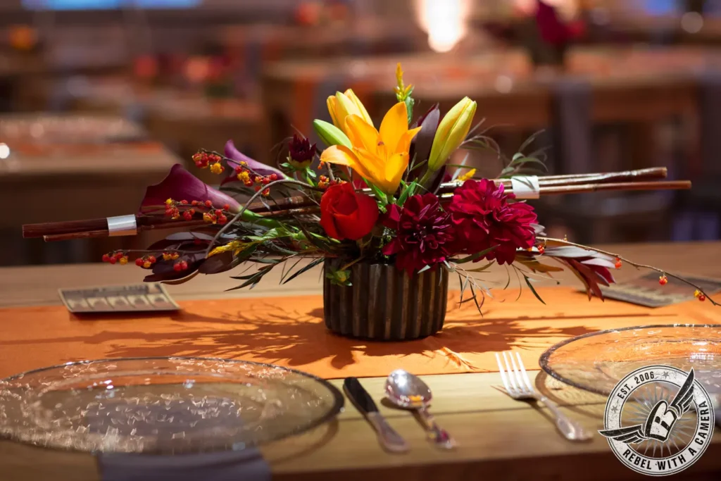 Colorful floral centerpiece on a decorated event table in Austin, TX.