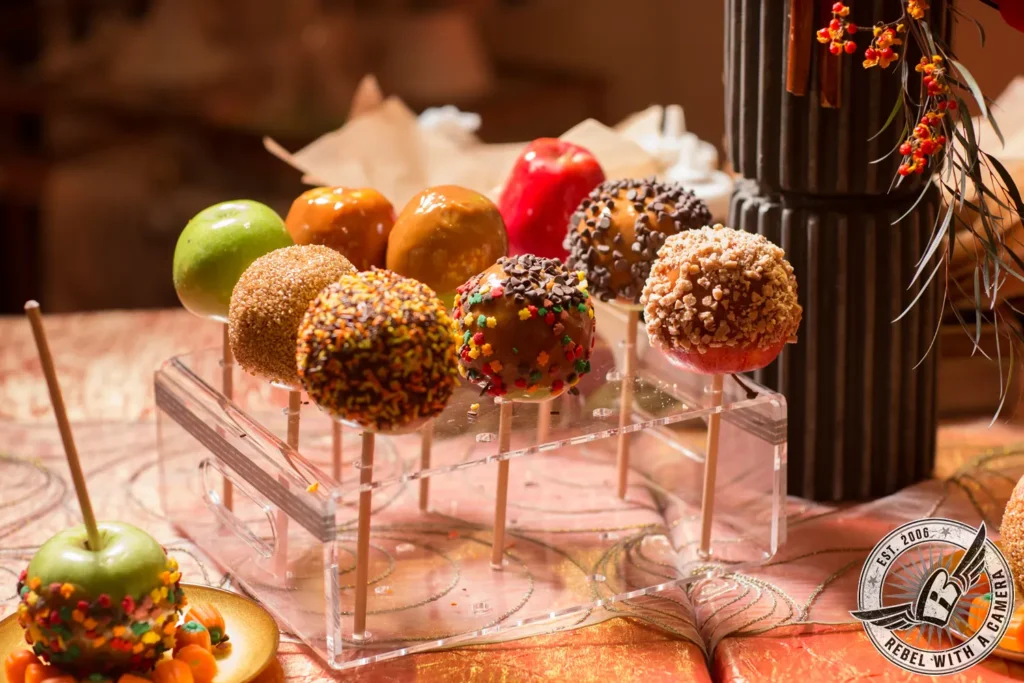 Caramel apples and decorated cake pops at an event in Austin, TX.